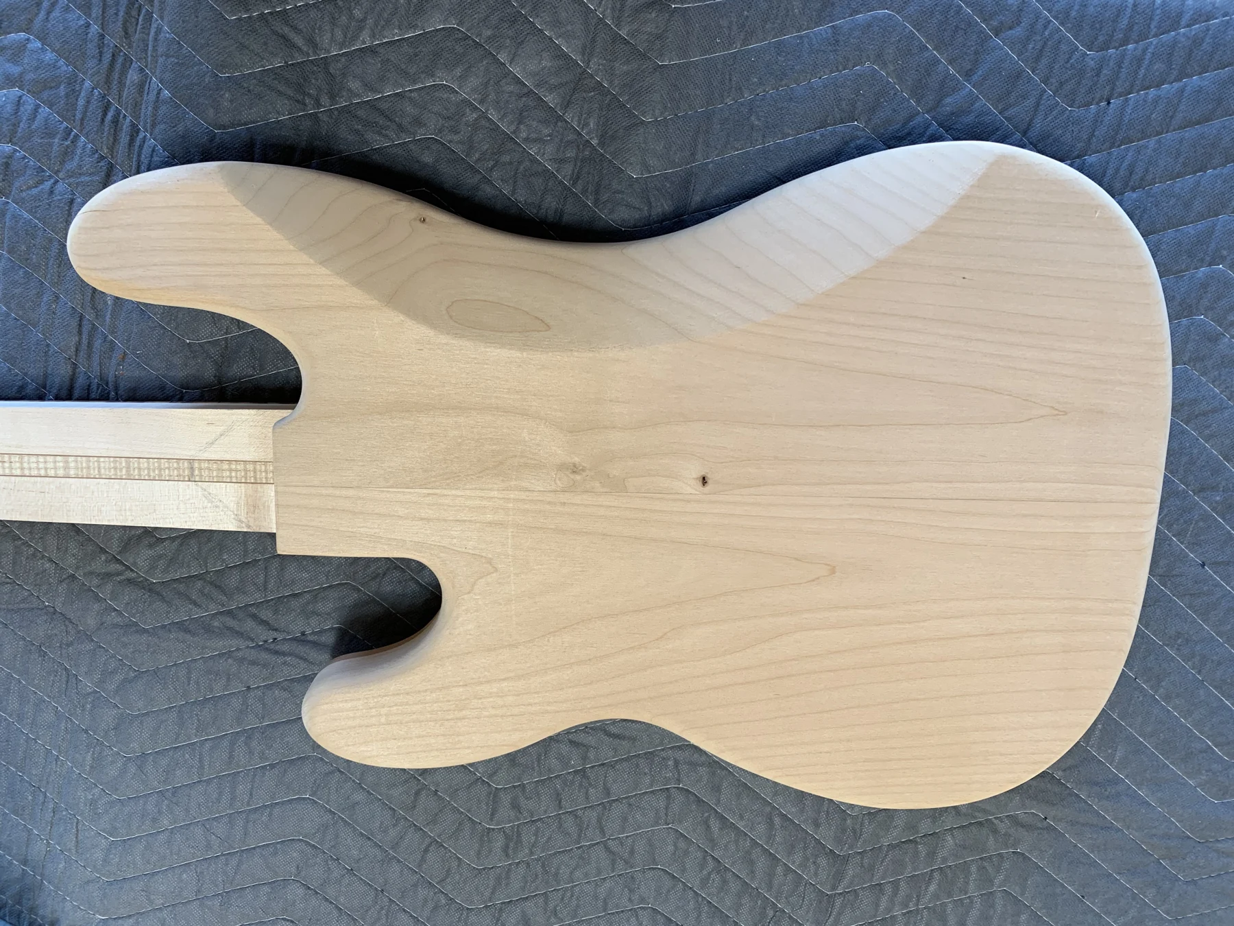 Shaped electric guitar body